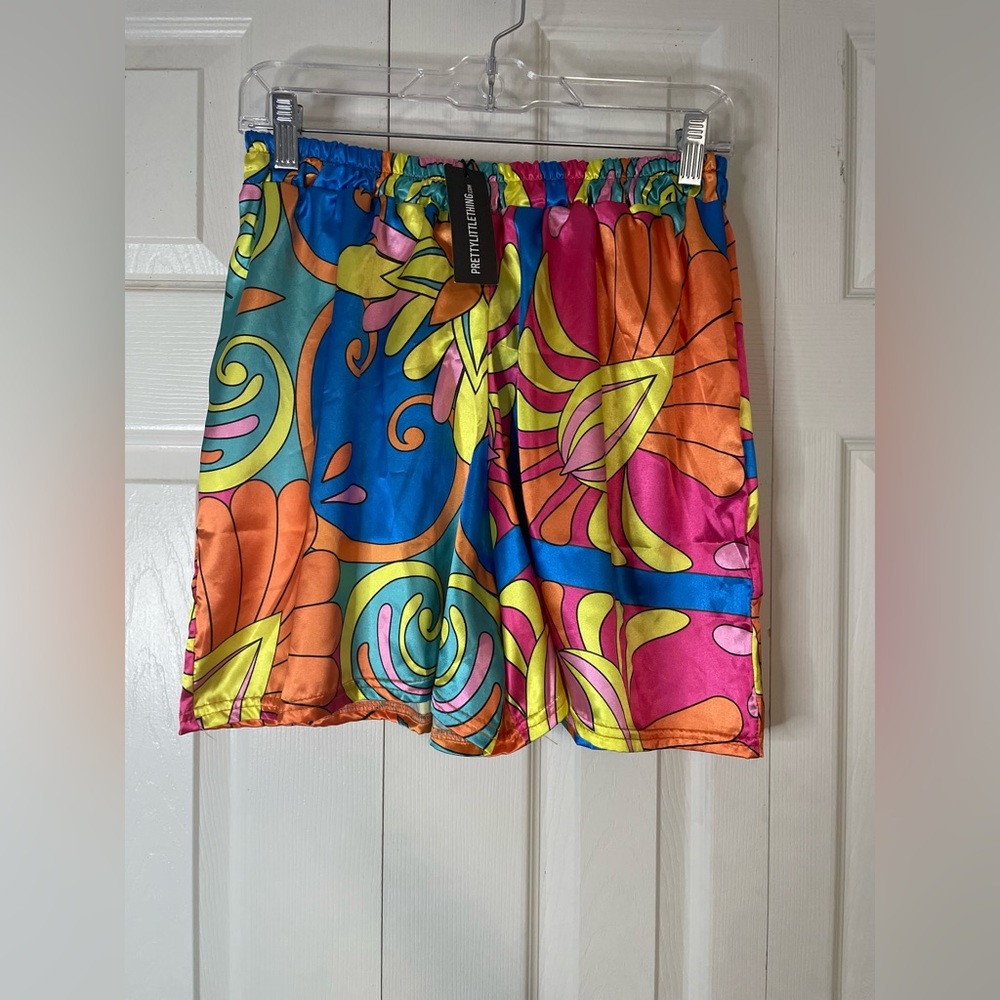 Satin beach shorts.